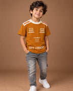 Mustard Kids’ City Current Seven T-Shirt, child model front three-quarter view. T-shirt only.