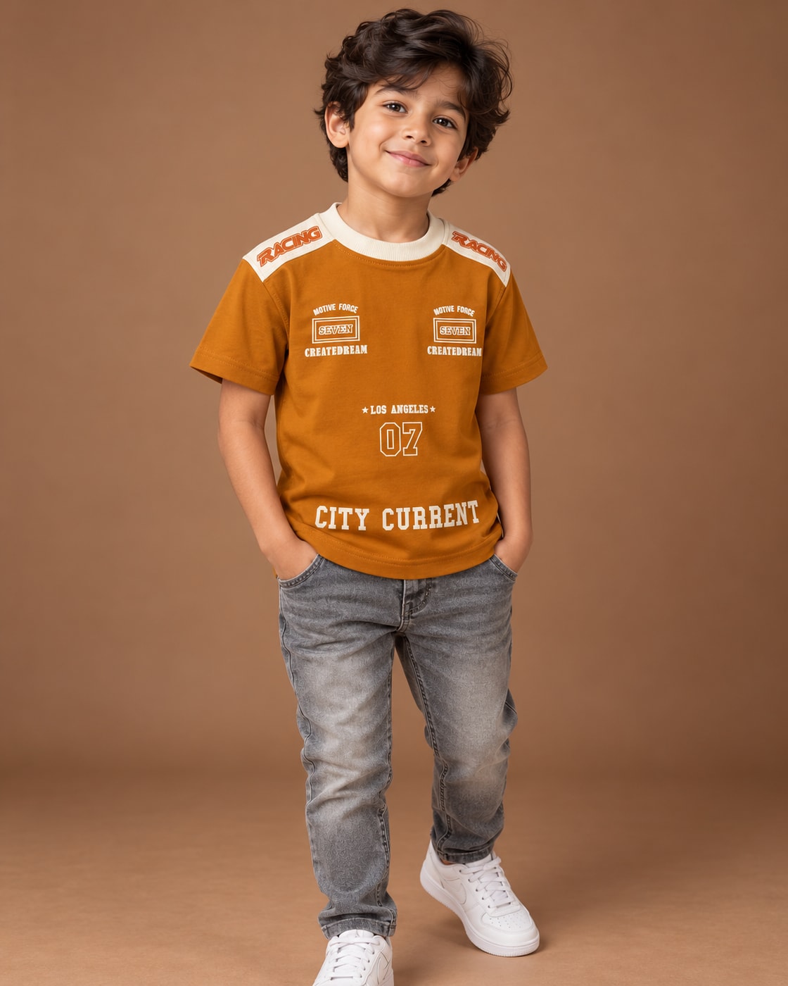 Mustard Kids’ City Current Seven T-Shirt, child model front three-quarter view. T-shirt only.