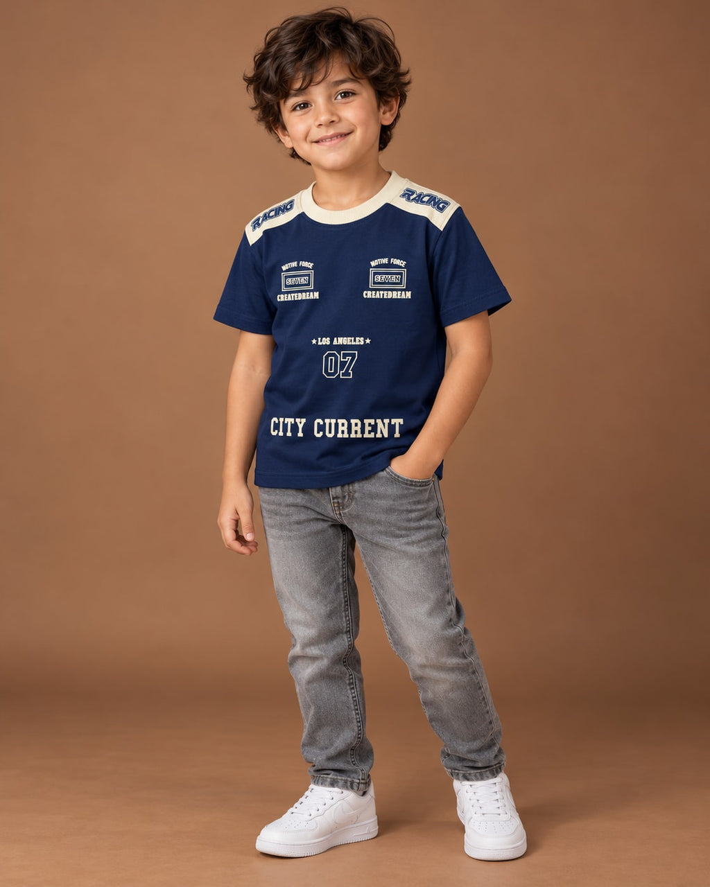 Navy Kids’ City Current Seven T-Shirt, child model front three-quarter view. T-shirt only.