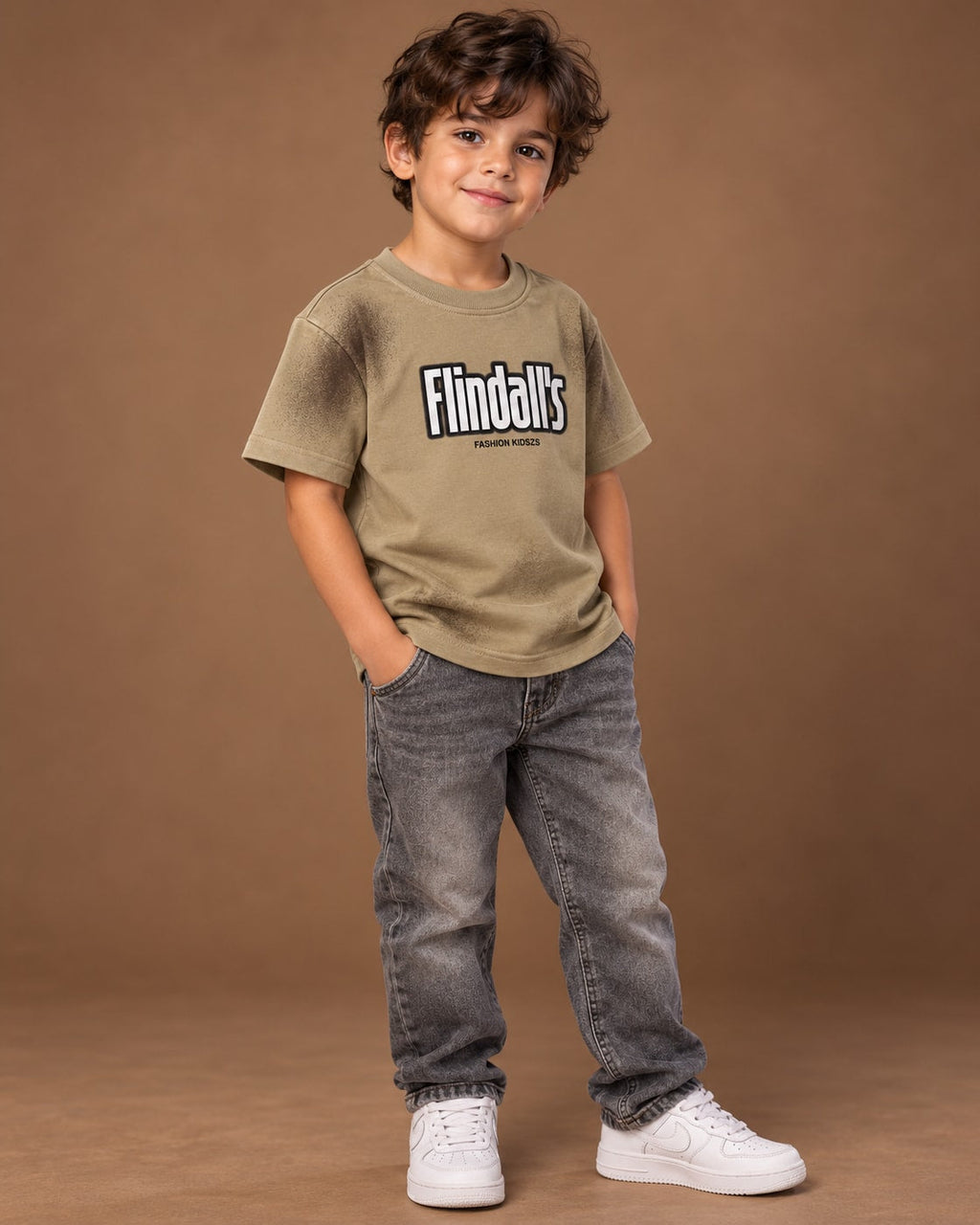 Khaki Kids’ Flindall’s Star Graphic T-Shirt, child model front three-quarter view. T-shirt only.