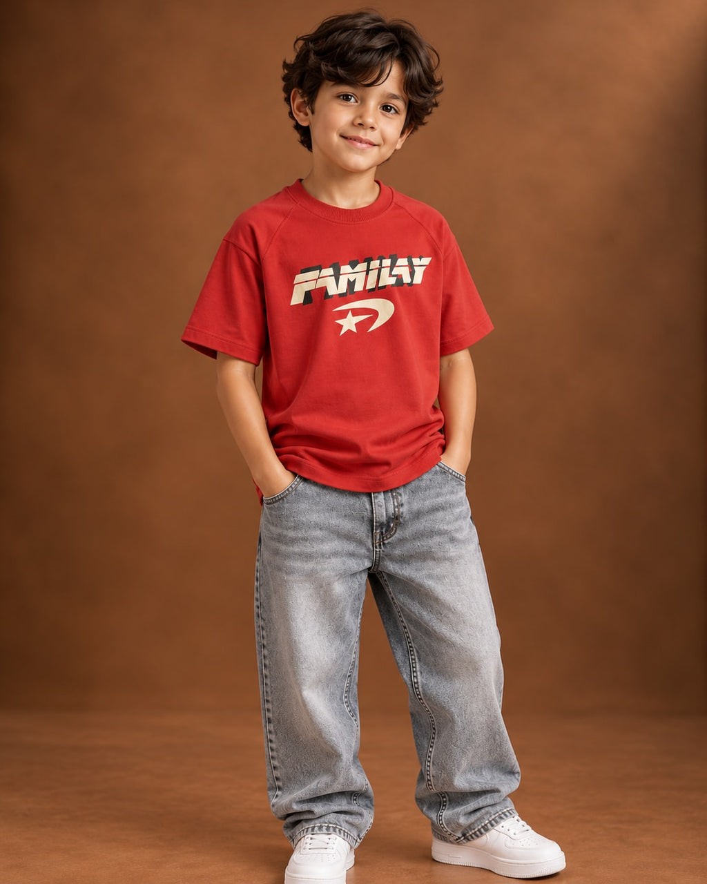 Red Kids’ Fmilay Studio Graphic T-Shirt, child model front three-quarter view. T-shirt only.
