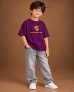Purple Kids’ Motorsport Studio Graphic T-Shirt, child model front three-quarter view. T-shirt only.