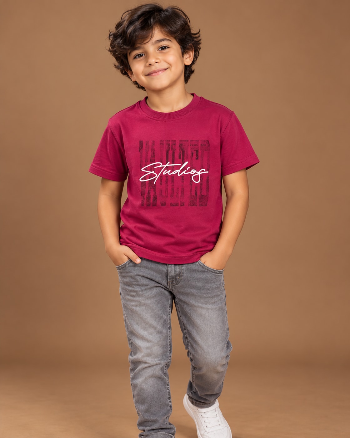 Berry Kids’ Studios Graphic T-Shirt, child model front three-quarter view. T-shirt only.