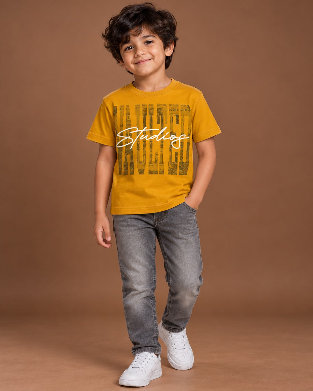 Mustard Kids’ Studios Graphic T-Shirt, child model front three-quarter view. T-shirt only.