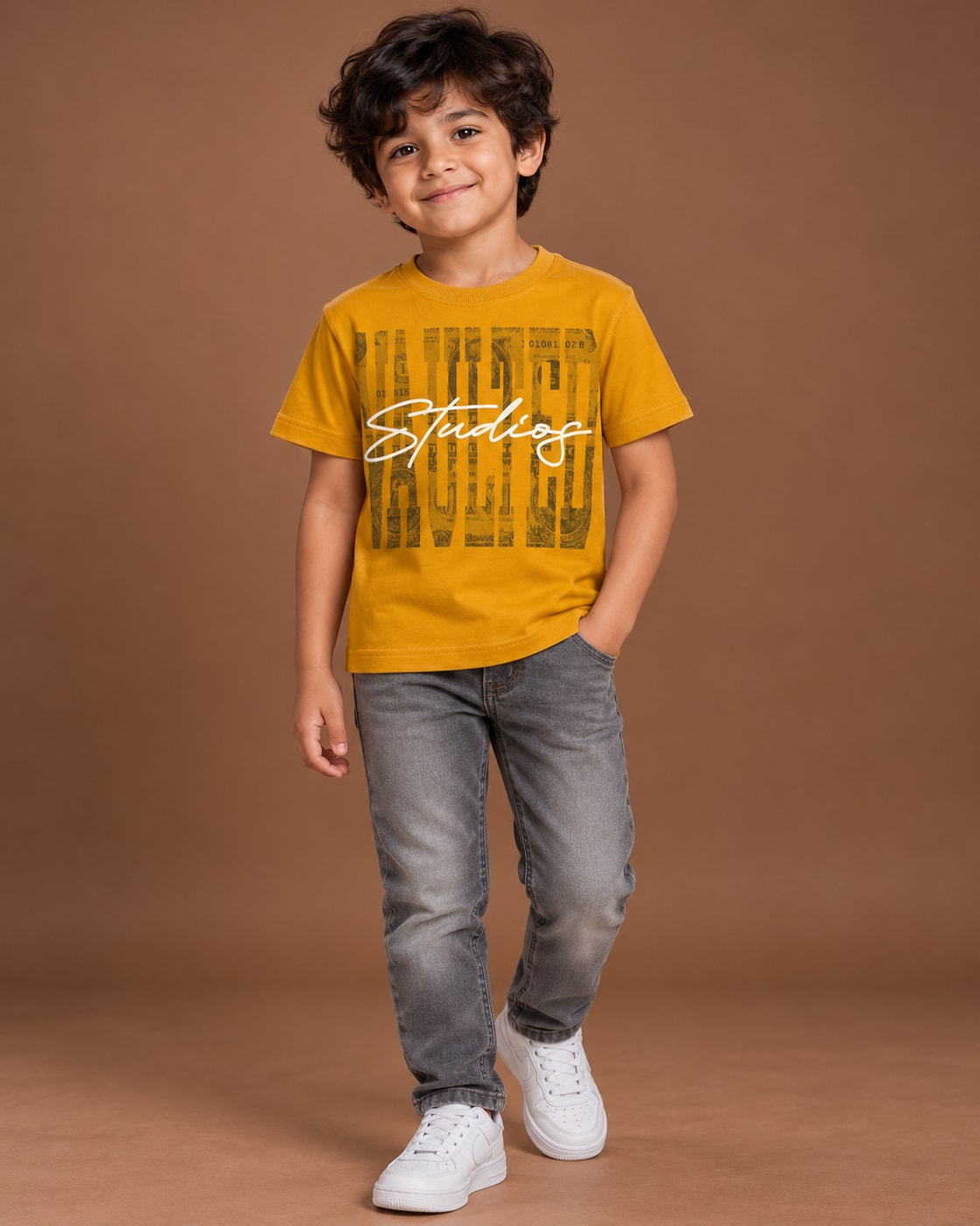 Mustard Kids’ Studios Graphic T-Shirt, child model front three-quarter view. T-shirt only.