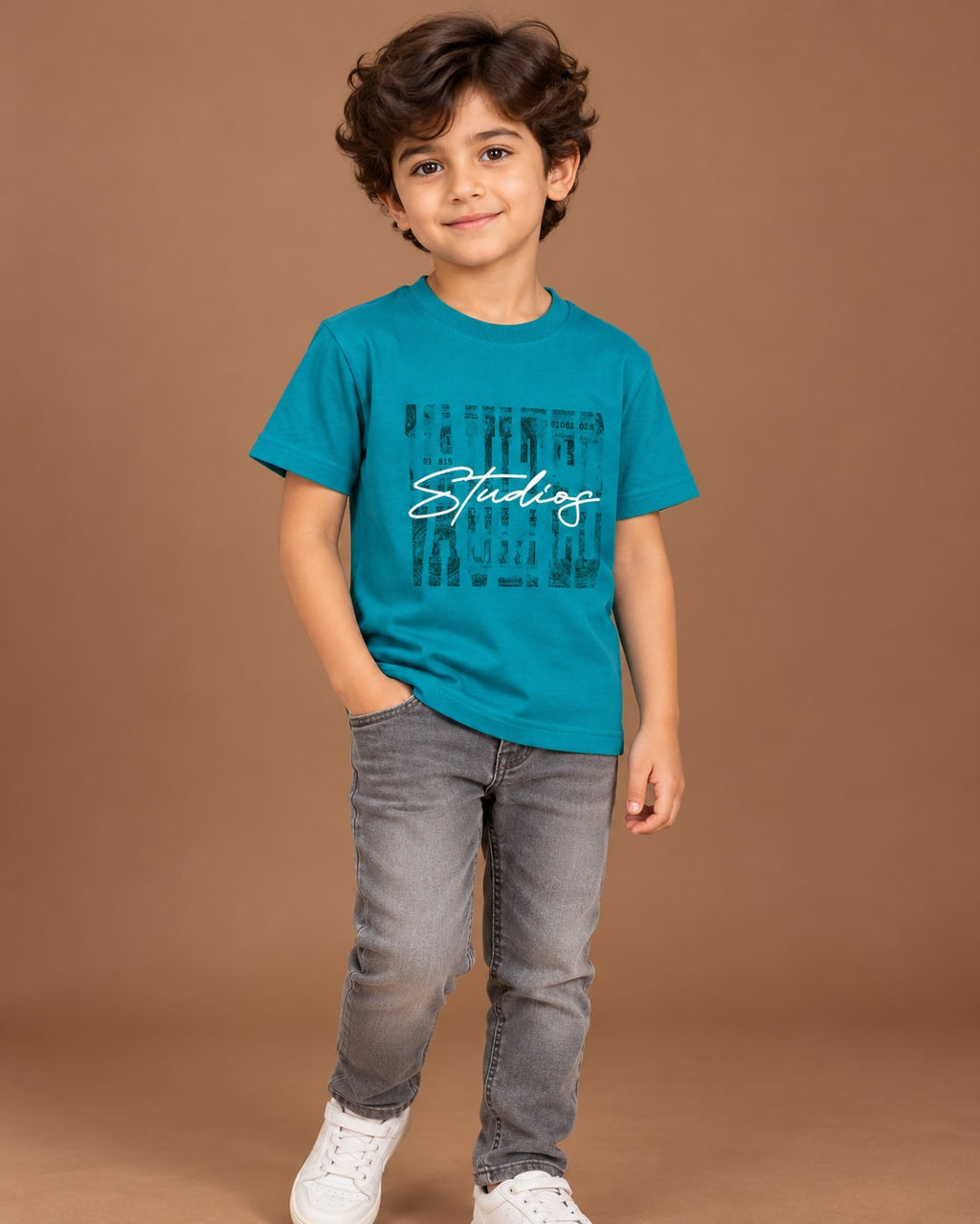 Teal Kids’ Studios Graphic T-Shirt, child model front three-quarter view. T-shirt only.
