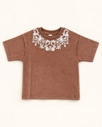 Front view of brown kids’ ornamental print t-shirt.