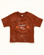 Front view of rust kids’ pathfinder graphic t-shirt.