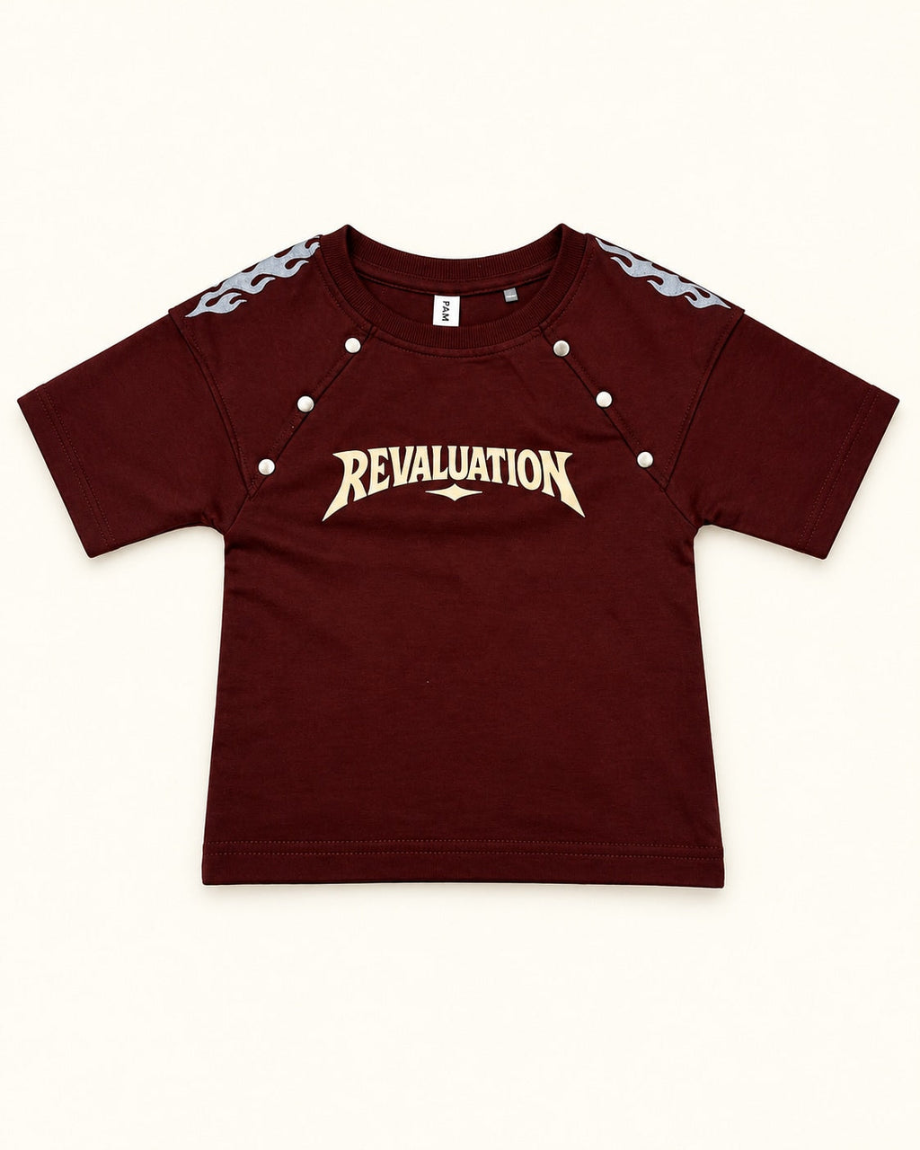 Front view of burgundy kids’ revaluation graphic t-shirt.